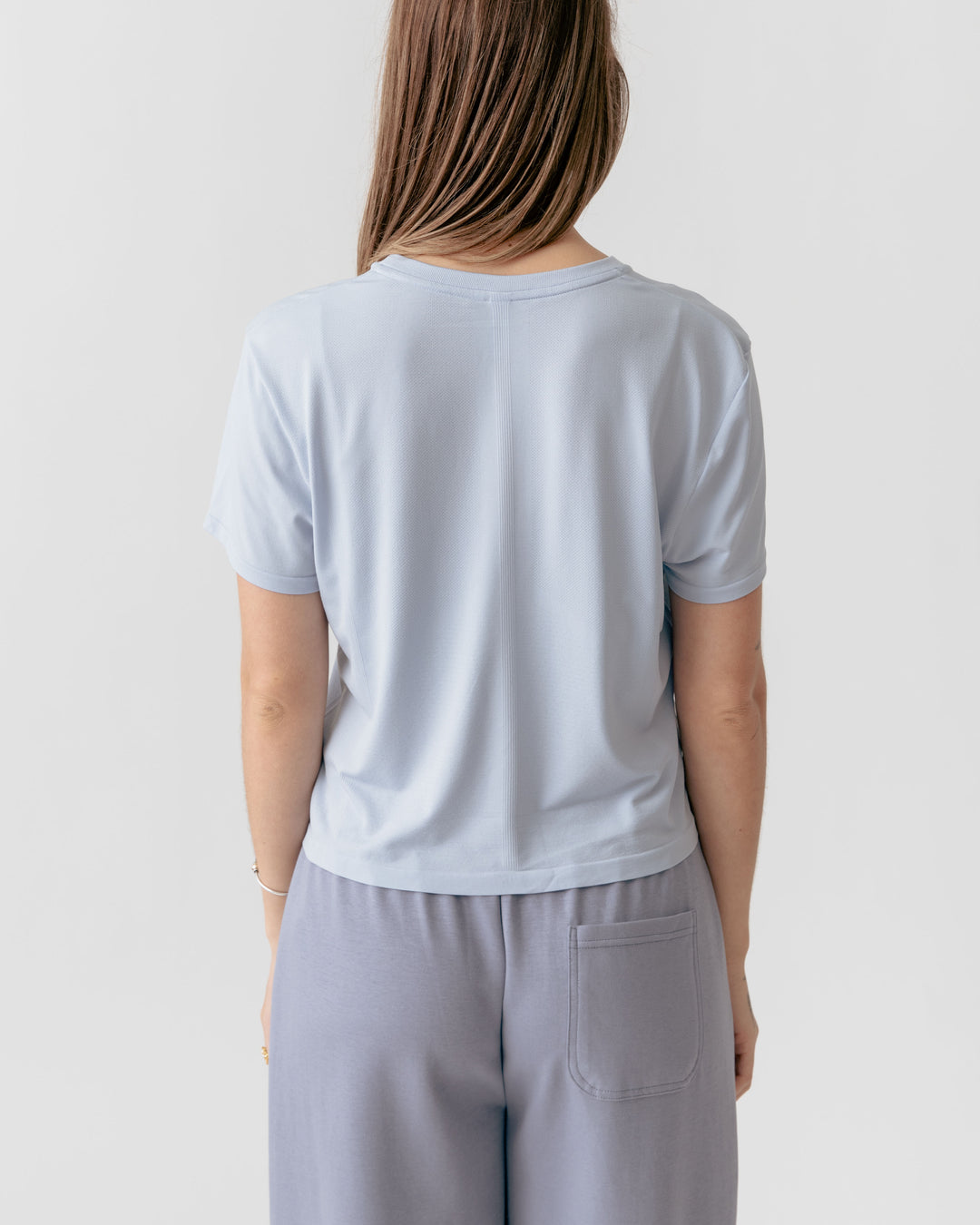 Back of a Sky Blue Cropped Crewneck T-Shirt