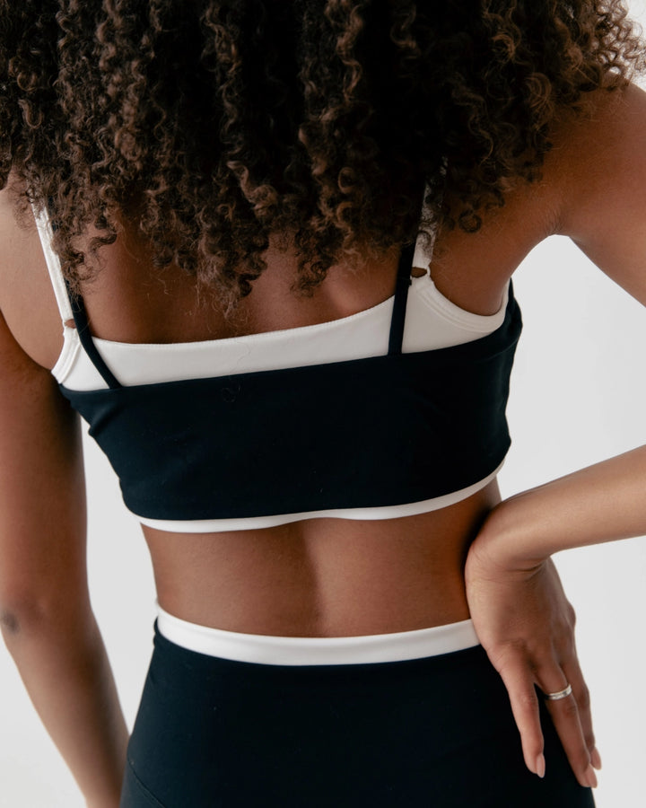 Closeup view of back of woman wearing Luxe Layer Double-Layer Overlay Bra